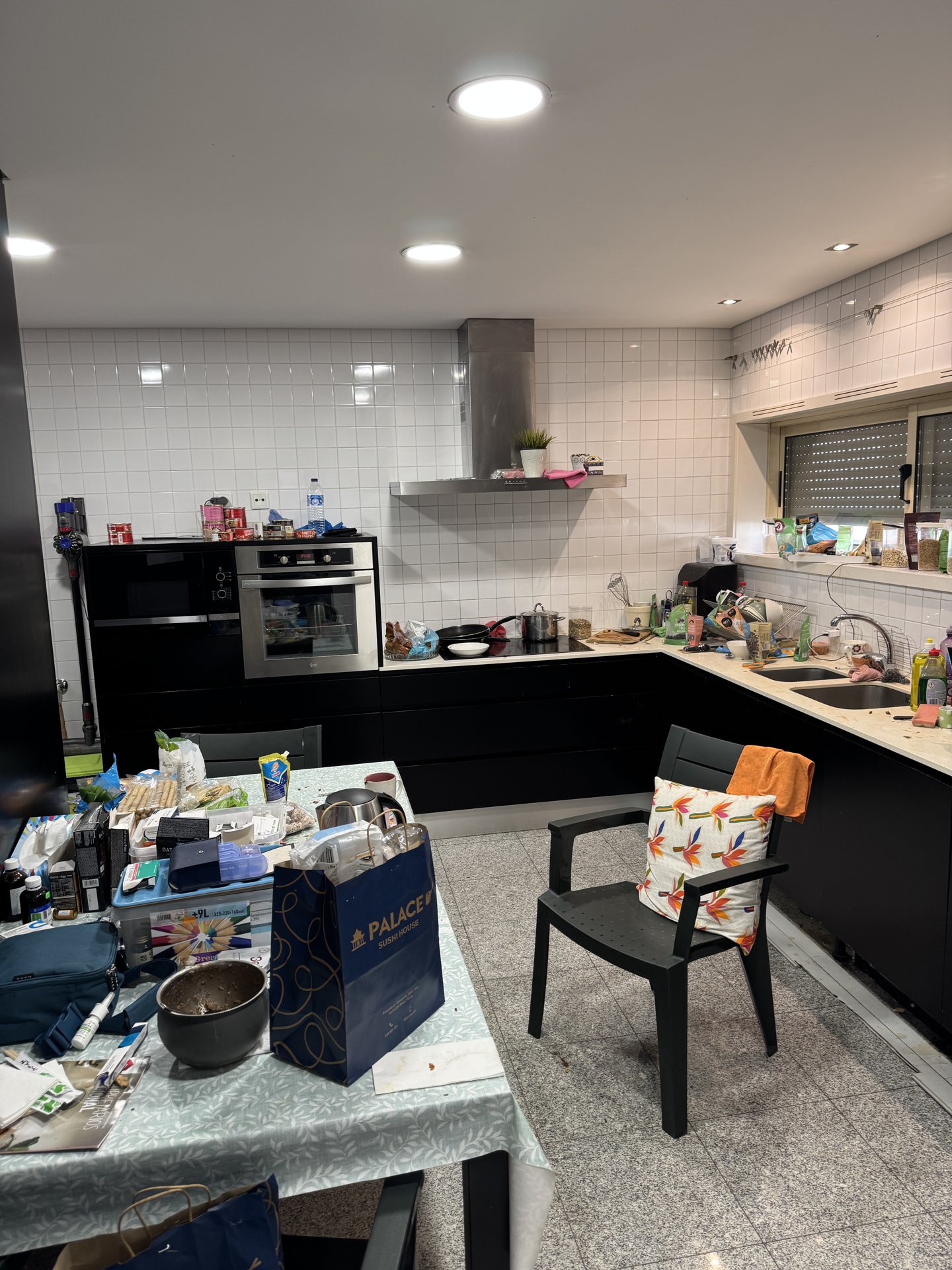 The kitchen — induction stove, granite counter, plenty of room