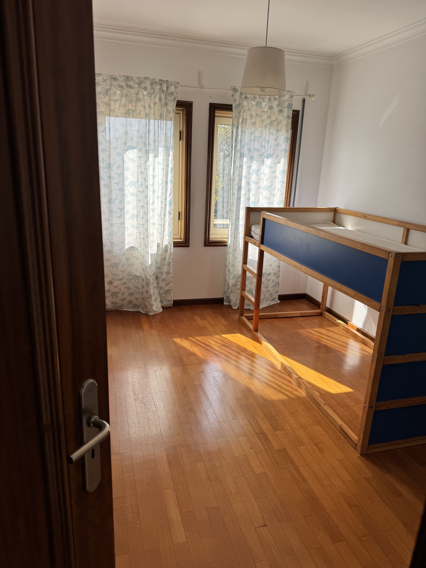 A bedroom with bunk beds, useful for two friends