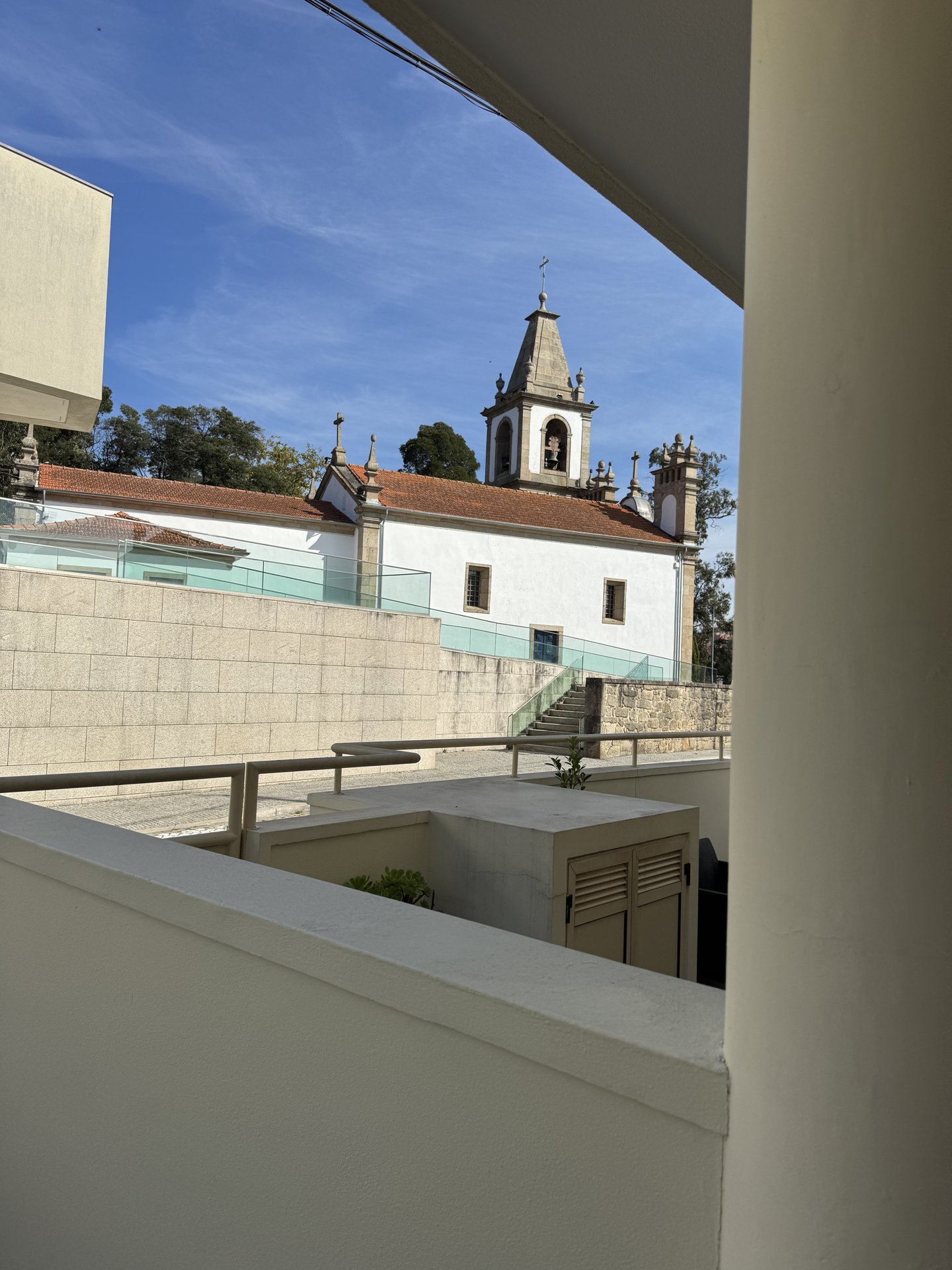 A view from the house toward the church next door